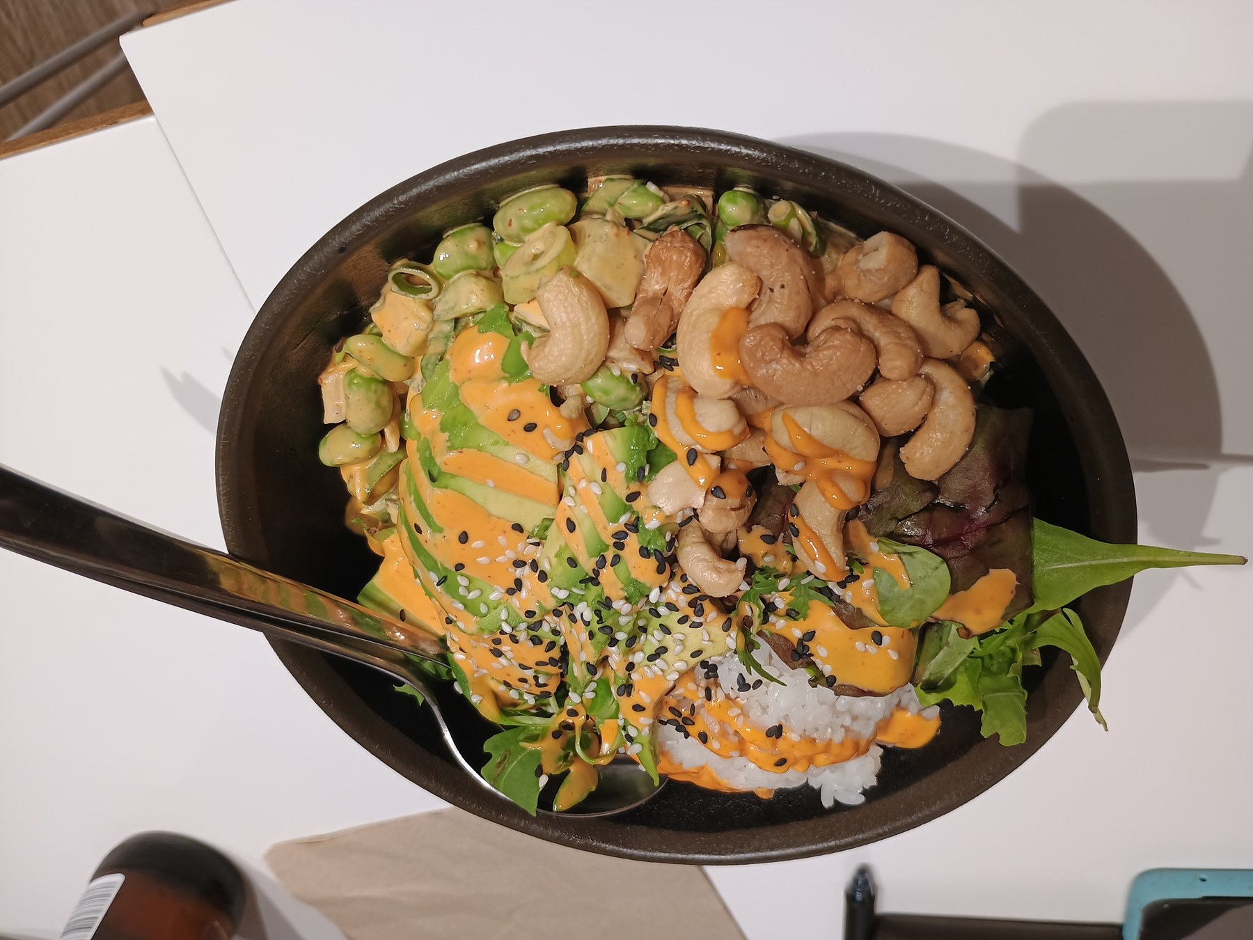 Poke bowl with teriyaki chicken, rice and vegetables