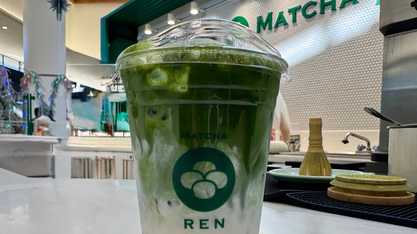 Iced strawberry matcha latte with red, white and green layers